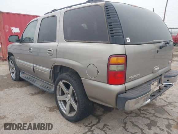 2003 GMC Yukon SLT with VIN 1GKEC13V33J287668, listed as a IAAI auction lot 41561108 with 326,719 mi miles. Bid and sale history available at carsss.com. Image 3.