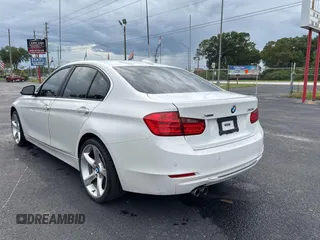 2015 BMW 3 Series 328i xDrive with VIN WBA3B5C59FP654679, listed as a Copart auction lot 59805525 with 120,885 mi miles and Clean title. Bid and sale history available at DreamBid. Image 3.