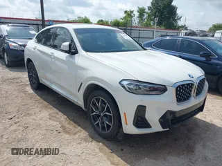 2023 BMW X4 xDrive30i z VIN 5UX33DT01P9S83083, wystawiony jako IAAI lot #42252039 z przebiegiem Nie podano mil oraz . Historia ofert i sprzedaży dostępna na DreamBid. Obrazek 1.