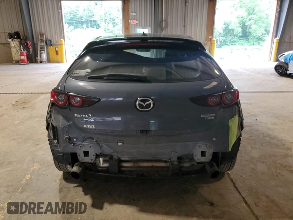2021 Mazda 3 Premium Plus with VIN JM1BPBNYXM1311594, listed as a Copart auction lot 61470625 with 89,254 mi miles and Salvage title. Bid and sale history available at DreamBid. Image 6.