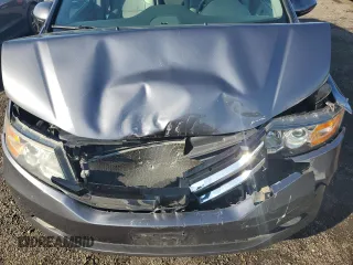 2014 Honda Odyssey Touring with VIN 5FNRL5H94EB116891, listed as a Copart auction lot 61400725 with 202,972 mi miles and Salvage title. Bid and sale history available at DreamBid. Image 12.
