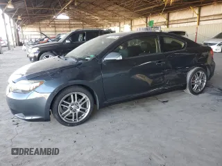 2005 Scion tC with VIN JTKDE177950027533, listed as a Copart auction lot 77613954 with 179,691 mi miles and Salvage Title. Bid and sale history available at carsss.com. Image 1.