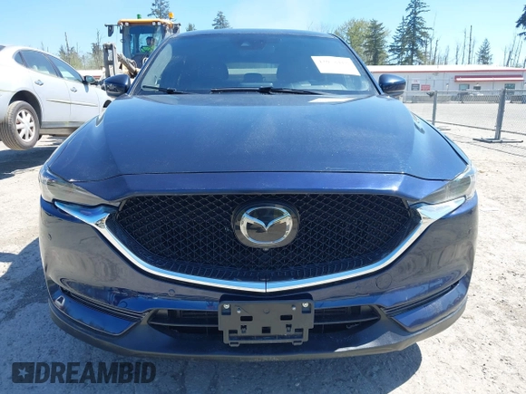 2019 Mazda CX-5 Signature with VIN JM3KFBEY7K0589236, listed as a IAAI auction lot 42078418 with 86,959 mi miles. Bid and sale history available at carsss.com. Image 12.