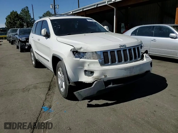2011 Jeep Grand Cherokee Laredo with VIN 1J4RR4GG3BC671780, listed as a Copart auction lot 49179835 with 166,521 mi miles and Salvage Title. Bid and sale history available at carsss.com. Image 12.