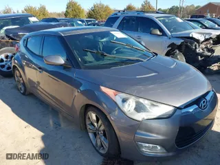 2012 Hyundai Veloster w/Gray Int with VIN KMHTC6AD8CU033426, listed as a IAAI auction lot 41600001 with 158,597 mi miles. Bid and sale history available at carsss.com. Image 1.