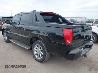 2003 Cadillac Escalade EXT z VIN 3GYEK63N23G315533, wystawiony jako IAAI lot #42354561 z przebiegiem 172 155 mil mil oraz . Historia ofert i sprzedaży dostępna na DreamBid. Obrazek 3.