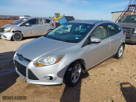 2014 Ford Focus SE with VIN 1FADP3K24EL430641, listed as a IAAI auction lot 41791968 with 112,976 mi miles. Bid and sale history available at carsss.com. Image 2.