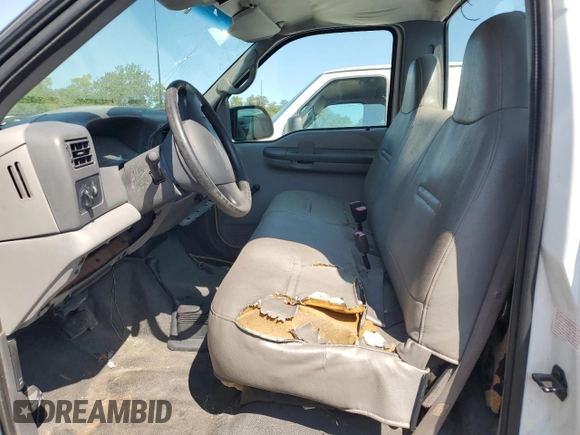 1999 Ford F-350 with VIN 1FDSF35L6XEA33184, listed as a Copart auction lot 69857024 with 100,545 mi miles and Salvage title. Bid and sale history available at DreamBid. Image 7.