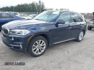 2015 BMW X5 xDrive35d with VIN 5UXKS4C55F0J98874, listed as a IAAI auction lot 42030583 with 151,079 mi miles. Bid and sale history available at carsss.com. Image 2.