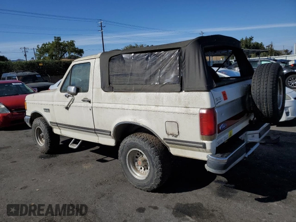 1989 Ford Bronco Custom с VIN 1FMEU15H0KLB48449, выставлен на аукционе Copart как лот 78316474 с пробегом 82 957 миль миль и Чистый • Clean title. История ставок и продаж доступна на DreamBid. Изображение 2.