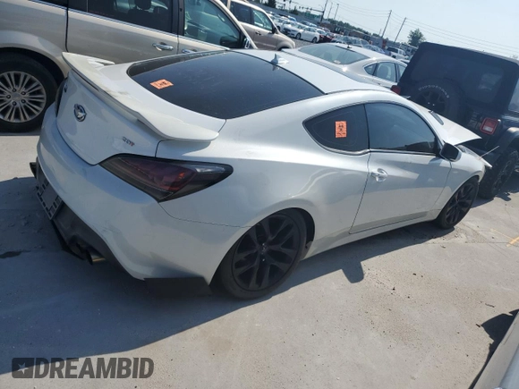 2013 Hyundai Genesis Coupe Premium z VIN KMHHT6KD4DU095556, wystawiony jako Copart lot #57264175 z przebiegiem 135 624 mil mil oraz Szkody całkowita. Historia ofert i sprzedaży dostępna na DreamBid. Obrazek 3.