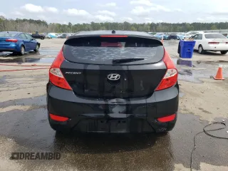 2014 Hyundai Accent SE z VIN KMHCU5AE2EU164130, wystawiony jako Copart lot #50972055 z przebiegiem 113 834 mil mil oraz Szkoda całkowita • Salvage title. Historia ofert i sprzedaży dostępna na DreamBid. Obrazek 6.