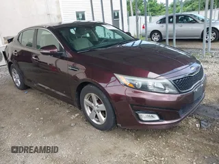 2014 Kia Optima LX with VIN 5XXGM4A79EG293294, listed as a IAAI auction lot 42529155 with 97,490 mi miles and . Bid and sale history available at DreamBid. Image 1.
