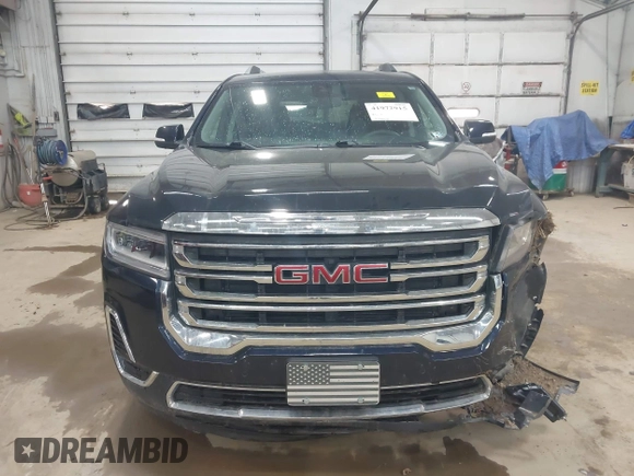 2021 GMC Acadia SLE with VIN 1GKKNRLS9MZ199809, listed as a IAAI auction lot 41972915 with 54,203 mi miles and . Bid and sale history available at DreamBid. Image 12.