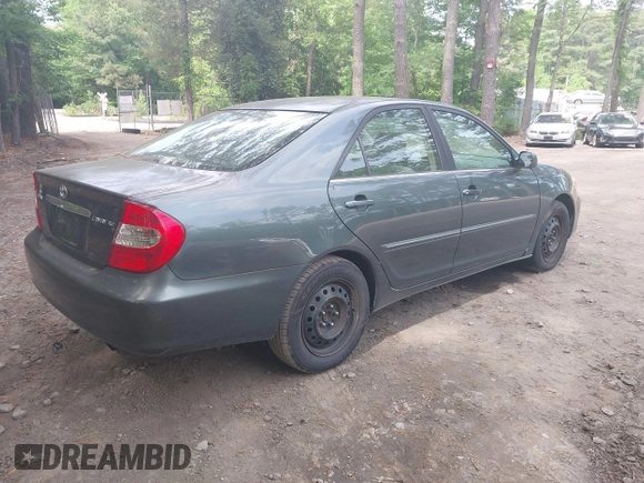 2002 Toyota Camry LE z VIN 4T1BE32K12U619689, wystawiony jako IAAI lot #42222078 z przebiegiem 216 591 mil mil oraz . Historia ofert i sprzedaży dostępna na DreamBid. Obrazek 4.