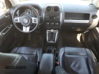 2016 Jeep Compass High Altitude Edition with VIN 1C4NJDEB3GD558111, listed as a Copart auction lot 51717964 with 126,832 mi miles and Salvage Title. Bid and sale history available at carsss.com. Image 8.