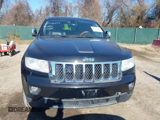 2011 Jeep Grand Cherokee Overland with VIN 1J4RS6GGXBC659349, listed as a IAAI auction lot 41778399 with 219,624 mi miles and . Bid and sale history available at DreamBid. Image 12.