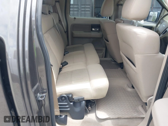 2005 Ford F-150 XLT with VIN 1FTPW12535KF05473, listed as a IAAI auction lot 42140281 with 163,023 mi miles. Bid and sale history available at carsss.com. Image 8.