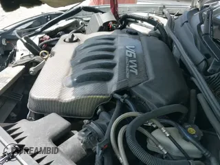 2014 Chevrolet Impala LS with VIN 2G1WA5E39E1171695, listed as a IAAI auction lot 39868253 with 154,582 mi miles and . Bid and sale history available at DreamBid. Image 12.