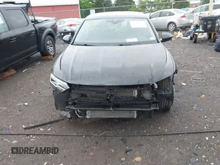 2023 Volkswagen Jetta SE with VIN 3VW7M7BUXPM038075, listed as a IAAI auction lot 42314234 with 19,490 mi miles and . Bid and sale history available at DreamBid. Image 6.