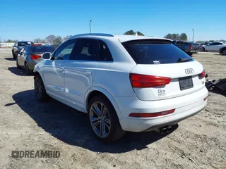 2018 Audi Q3 Premium Plus z VIN WA1JCCFS9JR019286, wystawiony jako IAAI lot #41607434 z przebiegiem 128 709 mil mil oraz . Historia ofert i sprzedaży dostępna na DreamBid. Obrazek 3.