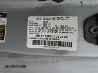 2004 Nissan 350Z Touring z VIN JN1AZ34E64T062124, wystawiony jako Copart lot #56890735 z przebiegiem 102 603 mil mil oraz Szkody całkowita. Historia ofert i sprzedaży dostępna na DreamBid. Obrazek 12.