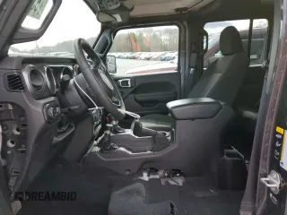 2023 Jeep Gladiator Sport S with VIN 1C6HJTAG9PL572388, listed as a Copart auction lot 53346475 with 11,081 mi miles and Salvage title. Bid and sale history available at DreamBid. Image 7.