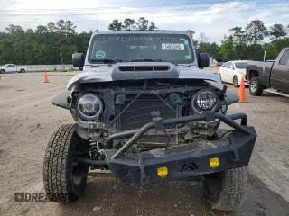 2020 Jeep Gladiator Sport S with VIN 1C6HJTAG9LL127546, listed as a Copart auction lot 54955945 with 99,511 mi miles and Salvage title. Bid and sale history available at DreamBid. Image 5.