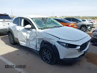 2022 Mazda CX-30 S with VIN 3MVDMBAL9NM415797, listed as a IAAI auction lot 42277998 with 33,711 mi miles and . Bid and sale history available at DreamBid. Image 1.