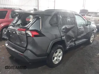 2021 Toyota RAV4 XLE with VIN 2T3W1RFVXMW117830, listed as a IAAI auction lot 41865708 with 94,990 mi miles. Bid and sale history available at carsss.com. Image 4.
