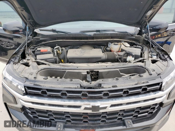 2023 Chevrolet Tahoe Commercial with VIN 1GNSCLED7PR428027, listed as a Copart auction lot 56738455 with 6,599 mi miles and Salvage title. Bid and sale history available at DreamBid. Image 12.