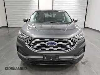 2021 Ford Edge SE z VIN 2FMPK4G95MBA23228, wystawiony jako Copart lot #51947405 z przebiegiem 80 522 mil mil oraz Czysty tytuł • Clean title. Historia ofert i sprzedaży dostępna na DreamBid. Obrazek 5.