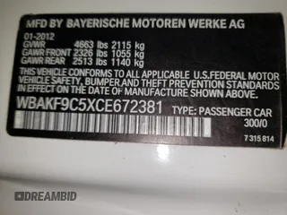 2012 BMW 3 Series 335i xDrive with VIN WBAKF9C5XCE672381, listed as a Copart auction lot 52201385 with 69,226 mi miles and Clean Title. Bid and sale history available at carsss.com. Image 12.