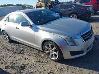 2013 Cadillac ATS Luxury z VIN 1G6AB5RA9D0165903, wystawiony jako IAAI lot #42044224 z przebiegiem 129 536 mil mil oraz . Historia ofert i sprzedaży dostępna na DreamBid. Obrazek 1.