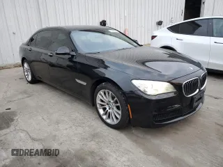 2014 BMW 7 Series 740Li xDrive with VIN WBAYF4C59ED281776, listed as a Copart auction lot 83563234 with 77,899 mi miles and Salvage Title. Bid and sale history available at carsss.com. Image 4.