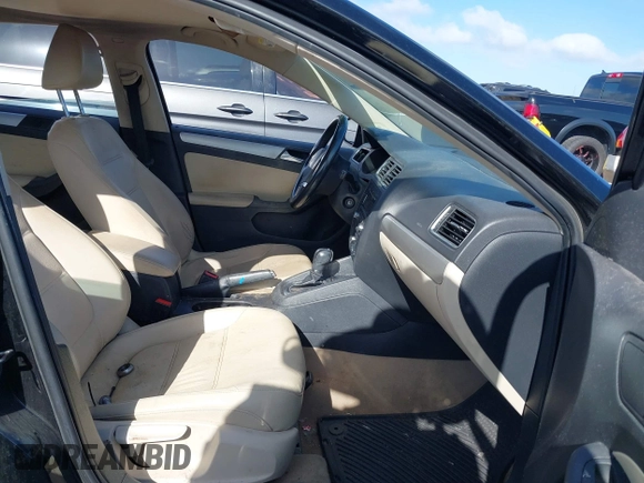 2012 Volkswagen Jetta TDI w/Premium with VIN 3VWLL7AJ3CM469621, listed as a IAAI auction lot 41831230 with 198,871 mi miles and . Bid and sale history available at DreamBid. Image 5.