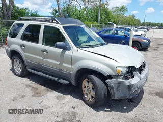 2005 Ford Escape XLT z VIN 1FMYU03165KB42372, wystawiony jako IAAI lot #42586341 z przebiegiem 216 241 mil mil oraz . Historia ofert i sprzedaży dostępna na DreamBid. Obrazek 1.