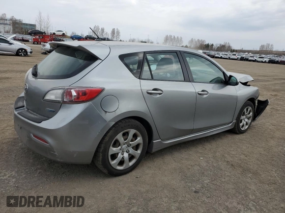 2012 Mazda 3 i Touring z VIN JM1BL1L74C1634540, wystawiony jako Copart lot #52929115 z przebiegiem 385 464 mil mil oraz Szkoda całkowita • Salvage title. Historia ofert i sprzedaży dostępna na DreamBid. Obrazek 3.