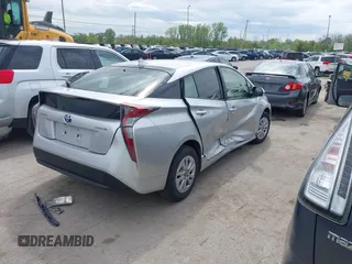 2016 Toyota Prius Two z VIN JTDKBRFU7G3002502, wystawiony jako IAAI lot #42241469 z przebiegiem 120 049 mil mil oraz . Historia ofert i sprzedaży dostępna na DreamBid. Obrazek 4.