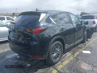2021 Mazda CX-5 Sport with VIN JM3KFABM1M0356760, listed as a IAAI auction lot 39131600 with 1 mi miles. Bid and sale history available at carsss.com. Image 4.