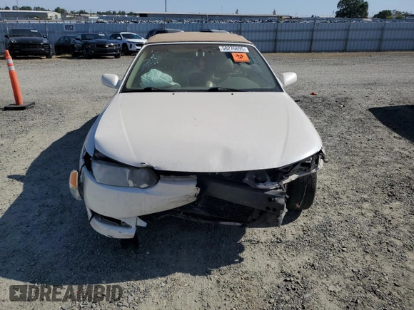 2002 Toyota Solara SE z VIN 2T1FF28P22C595397, wystawiony jako Copart lot #58276695 z przebiegiem Nie podano mil oraz Szkoda całkowita • Salvage title. Historia ofert i sprzedaży dostępna na DreamBid. Obrazek 5.
