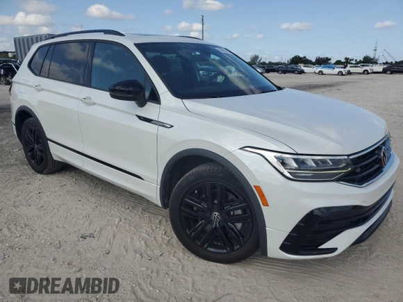 2022 Volkswagen Tiguan SE R-Line Black with VIN 3VVCB7AX1NM080975, listed as a Copart auction lot 56099945 with 42,376 mi miles and Salvage title. Bid and sale history available at DreamBid. Image 4.