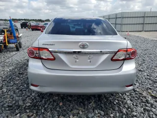 2013 Toyota Corolla L with VIN 2T1BU4EE7DC969296, listed as a Copart auction lot 55297805 with 126,351 mi miles and Salvage Title. Bid and sale history available at DreamBid. Image 6.