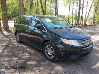 2013 Honda Odyssey EX-L with VIN 5FNRL5H69DB025040, listed as a IAAI auction lot 42078699 with 181,470 mi miles and . Bid and sale history available at carsss.com. Image 1.