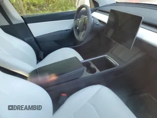 2022 Tesla Model Y Performance with VIN 7SAYGDEF3NF516349, listed as a Copart auction lot 63759245 with Not provided miles and Salvage title. Bid and sale history available at DreamBid. Image 8.