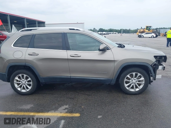 2019 Jeep Cherokee Latitude z VIN 1C4PJLCB2KD120503, wystawiony jako IAAI lot #42206232 z przebiegiem 115 714 mil mil oraz . Historia ofert i sprzedaży dostępna na DreamBid. Obrazek 14.