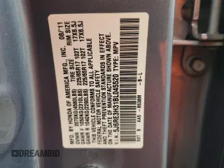 2011 Honda CR-V LX z VIN 5J6RE3H31BL045520, wystawiony jako Copart lot #59717755 z przebiegiem 166 163 mil mil oraz Szkoda całkowita • Salvage title. Historia ofert i sprzedaży dostępna na DreamBid. Obrazek 13.
