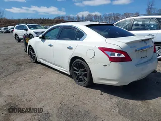 2011 Nissan Maxima S with VIN 1N4AA5AP7BC863931, listed as a IAAI auction lot 41930873 with 154,704 mi miles and . Bid and sale history available at DreamBid. Image 3.