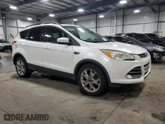 2015 Ford Escape SE with VIN 1FMCU9G92FUC86702, listed as a Copart auction lot 53479425 with 141,055 mi miles and Salvage Title. Bid and sale history available at DreamBid. Image 4.