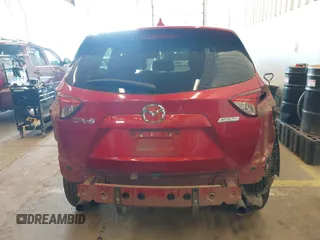 2016 Mazda CX-5 Sport z VIN JM3KE2BY3G0684861, wystawiony jako IAAI lot #42050897 z przebiegiem 165 688 mil mil oraz . Historia ofert i sprzedaży dostępna na DreamBid. Obrazek 17.
